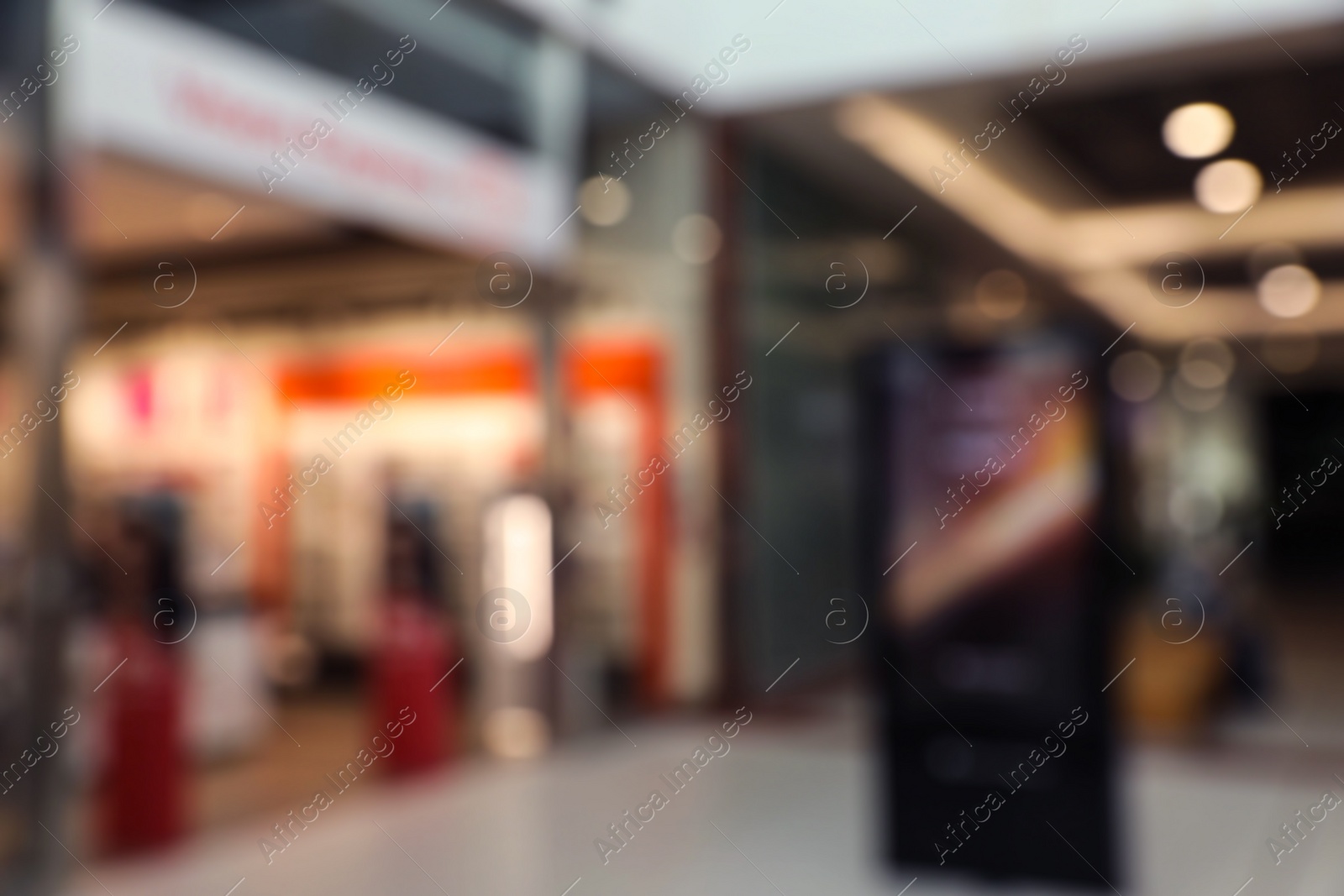 Photo of Blurred view of shopping mall interior. Bokeh effect