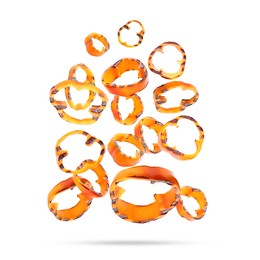 Image of Slices of grilled bell peppers in air on white background