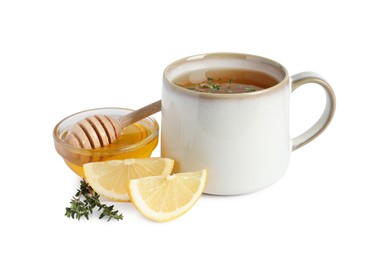 Aromatic herbal tea with thyme, honey and lemon isolated on white