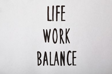 Life, Work, Balance written on white background, top view