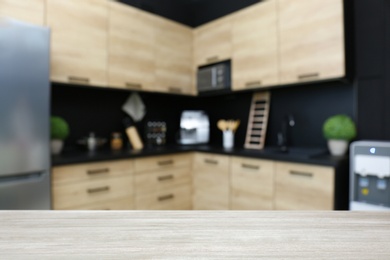 Image of Wooden table in kitchen. Space for design