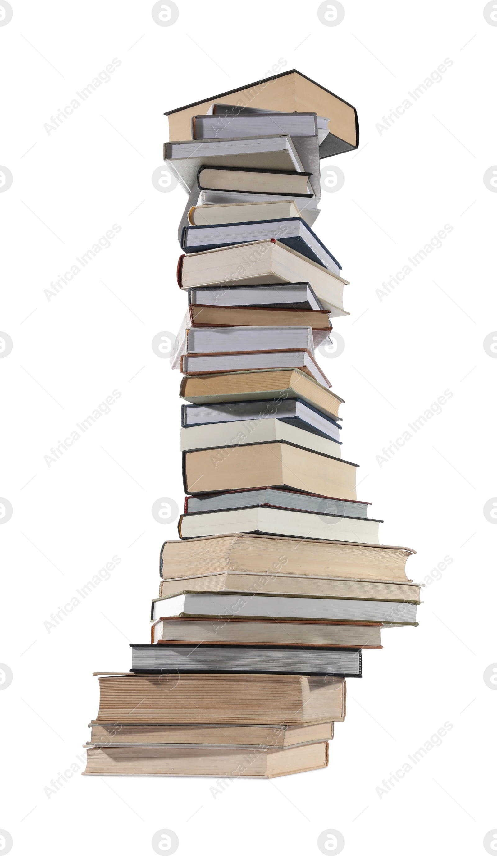 Photo of High stack of many different books isolated on white