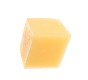 Cube of delicious cheese isolated on white