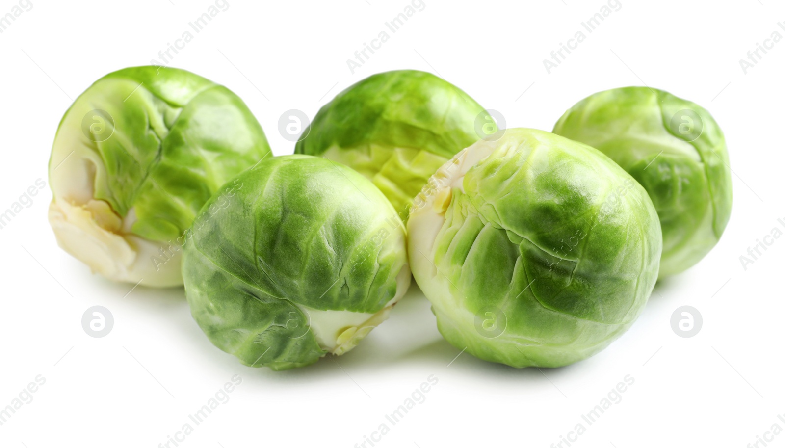 Photo of Fresh tasty Brussels sprouts on white background