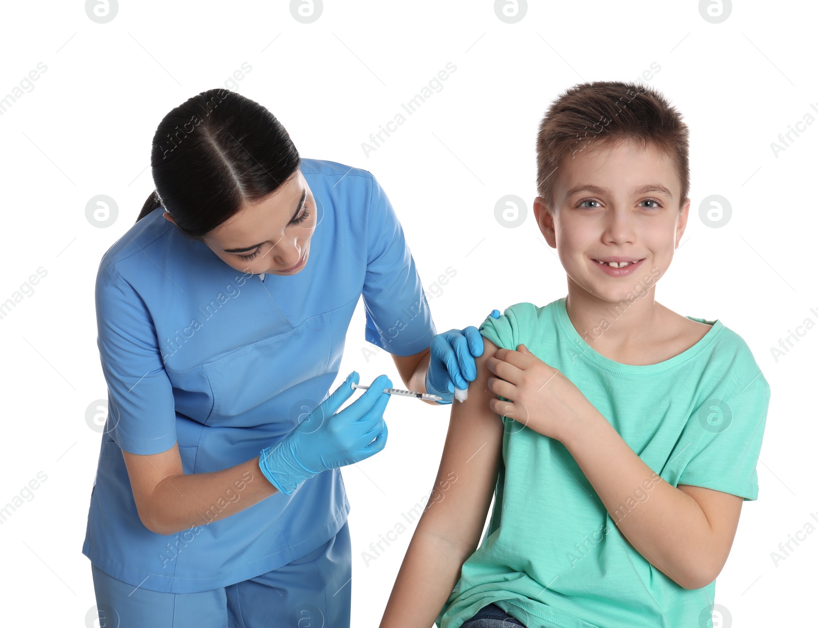 Photo of Doctor vaccinating little child on white background