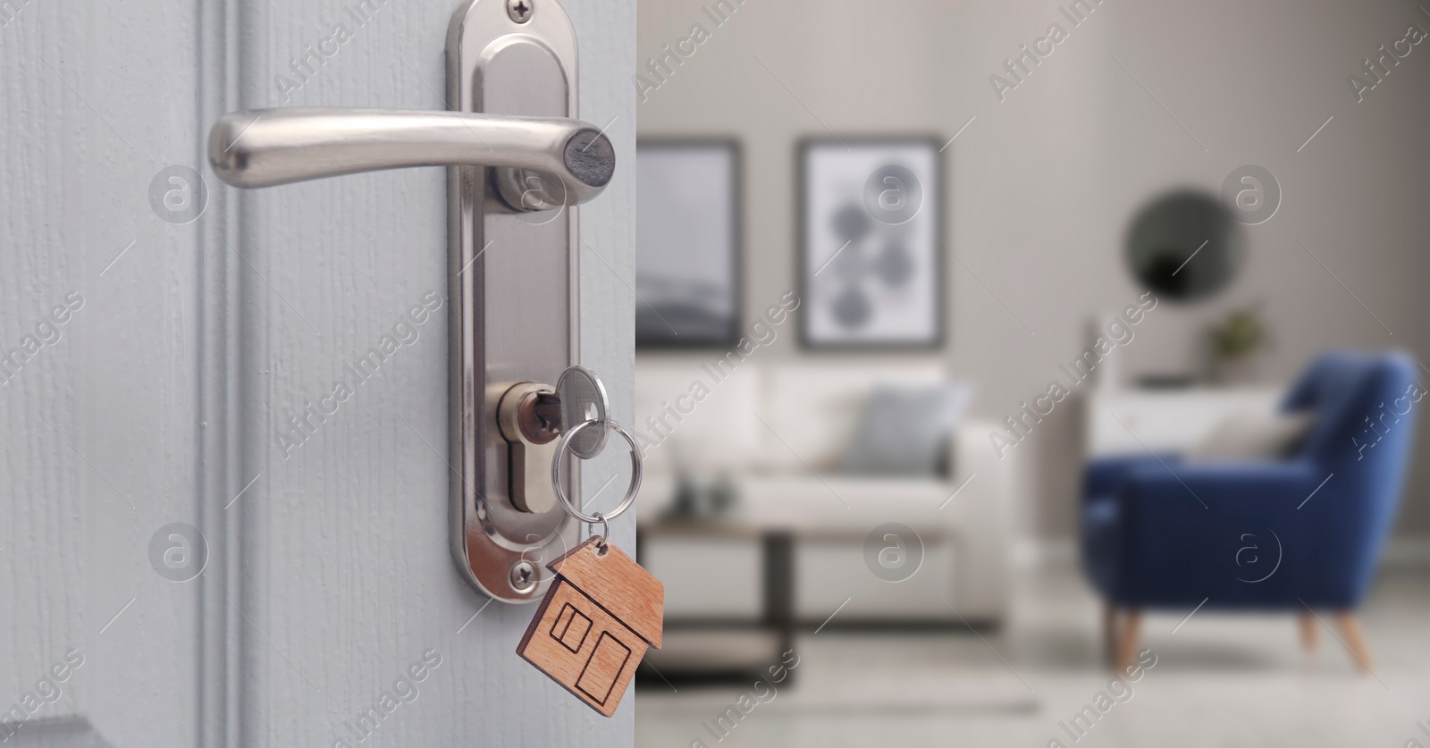 Image of Mortgage. Door with key open into room, space for text. Banner design