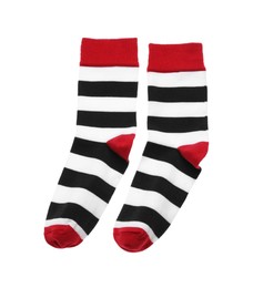 Photo of Striped socks on white background, top view
