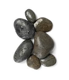 Wet spa stones on white background, top view