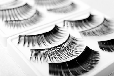 Different types of false eyelashes in pack, closeup