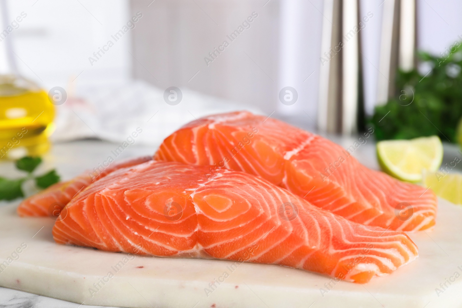 Photo of Fresh raw salmon on stone board. Fish delicacy