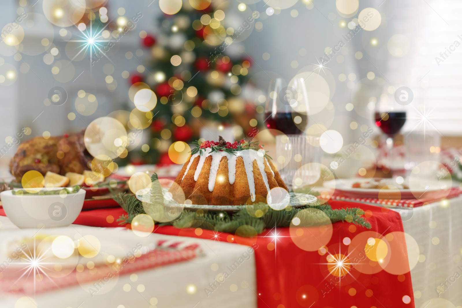 Image of Festive dinner with delicious cake served on table indoors. Christmas Eve celebration