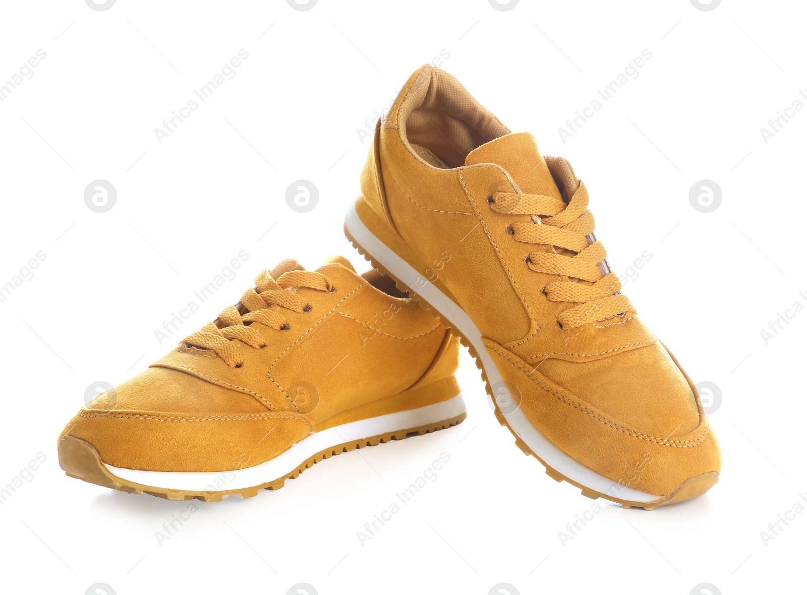 Photo of Pair of stylish shoes on white background