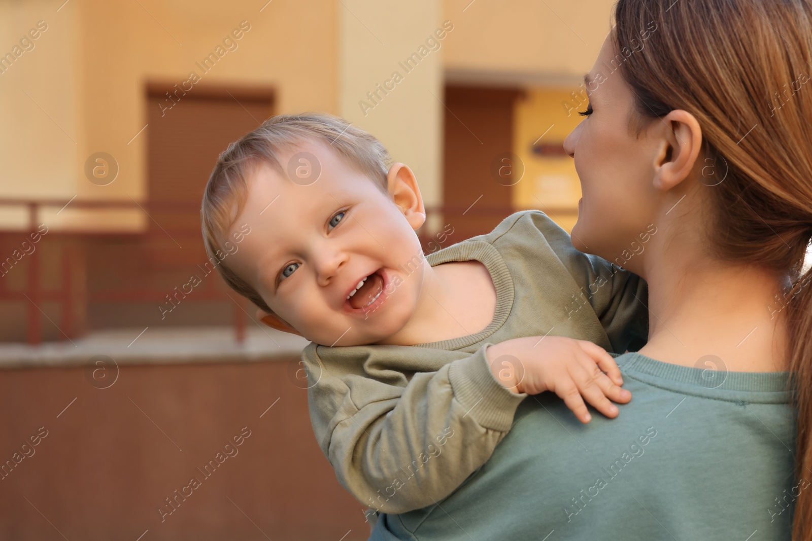 Photo of Portrait of nanny with cute little boy outdoors