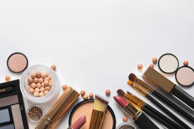 Photo of Different luxury makeup products on white background, top view