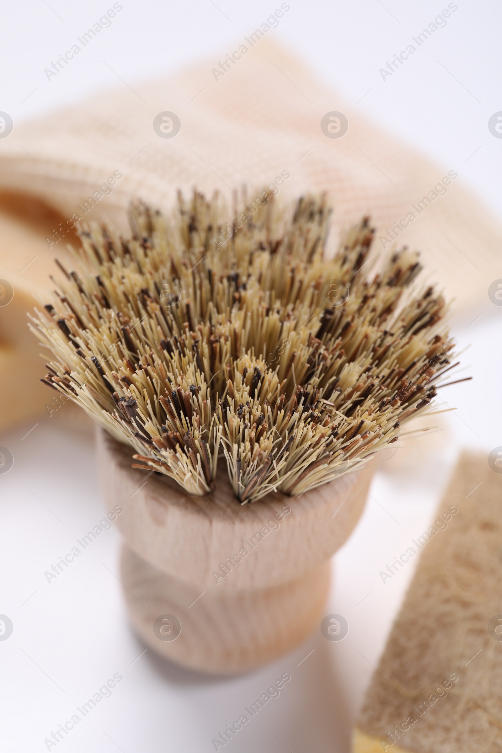 Photo of Cleaning brush on white background, closeup view