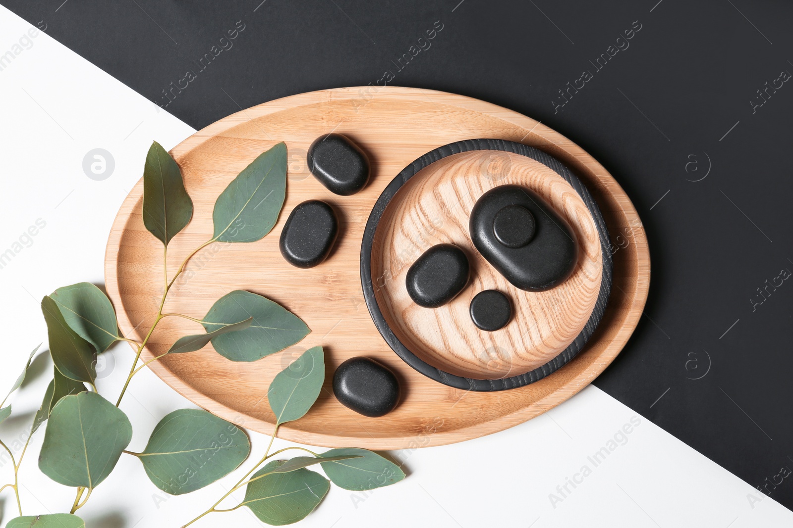 Photo of Flat lay composition with spa stones on color background