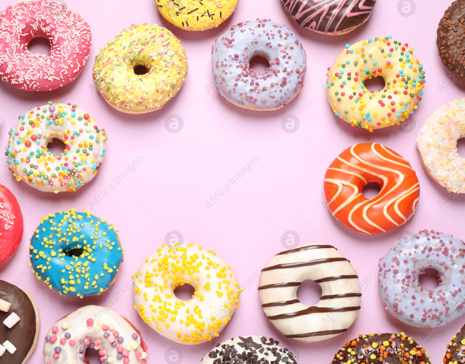 Photo of Delicious glazed donuts on lilac background, flat lay. Space for text