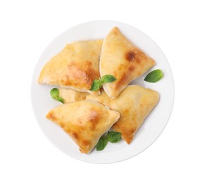 Photo of Delicious samosas and basil isolated on white, top view