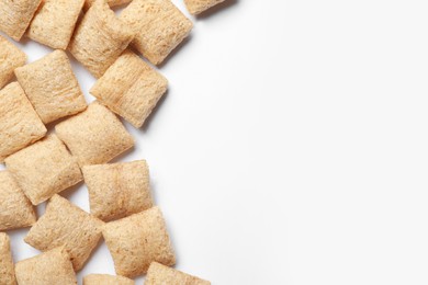 Delicious corn pads on white background, top view