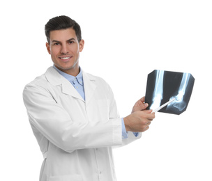 Orthopedist holding X-ray picture on white background