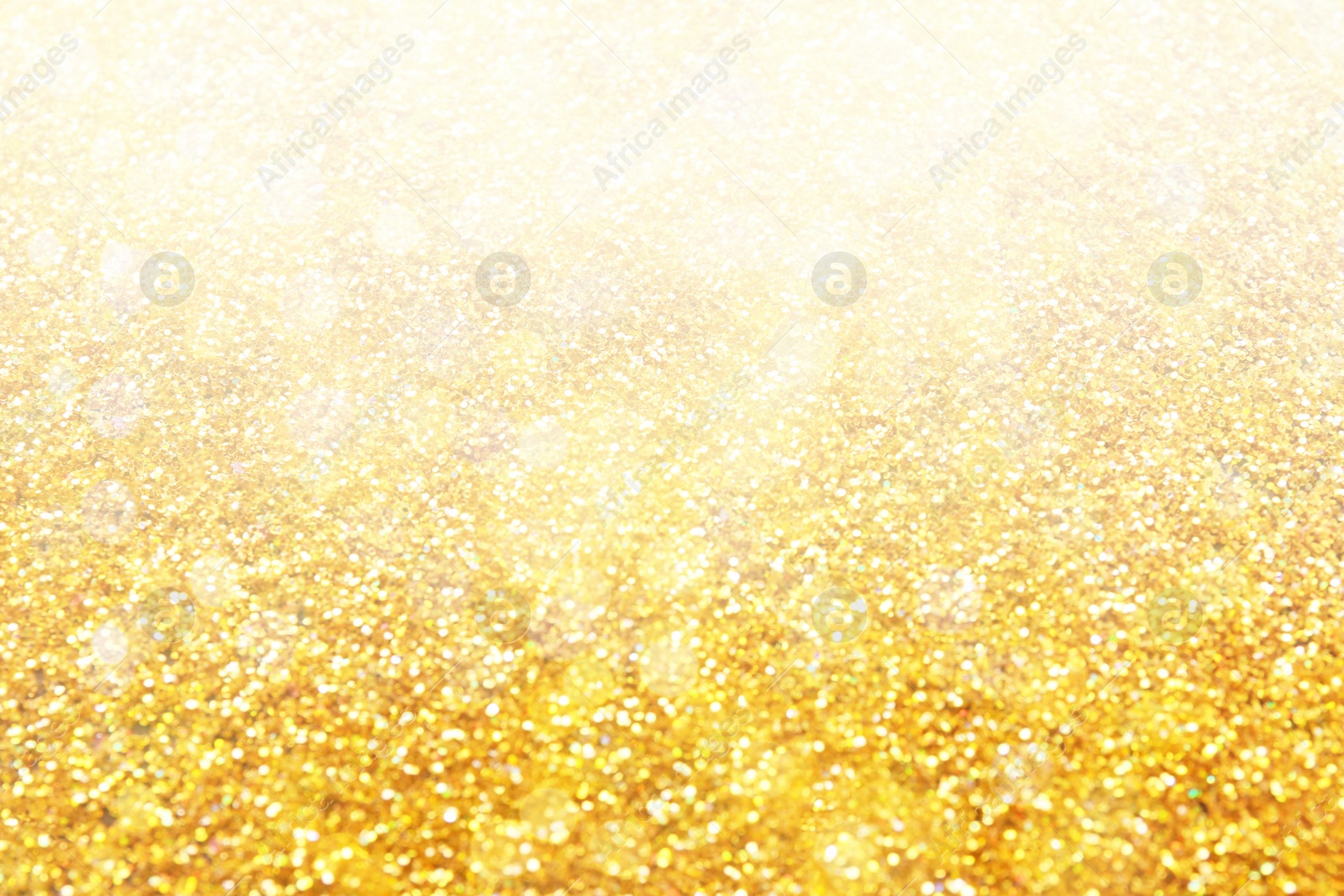 Image of Blurred view of gold glitter as abstract background, bokeh effect