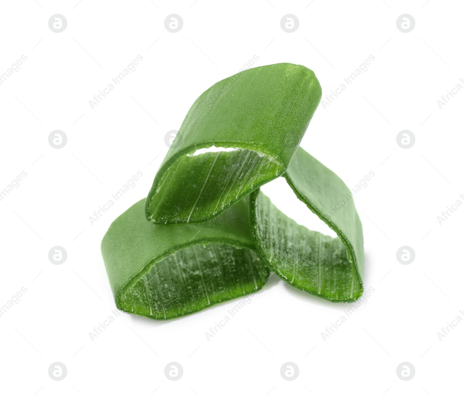 Photo of Pieces of fresh green onion isolated on white