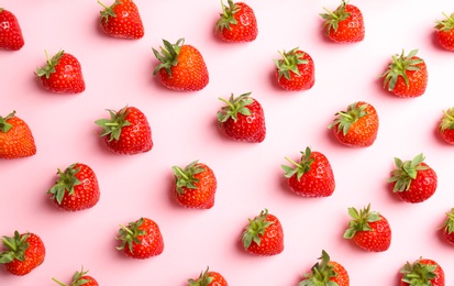 Flat lay composition with with tasty ripe strawberries on color background