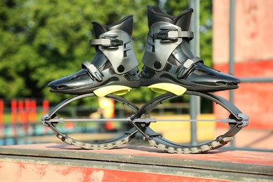 Stylish kangoo jumping boots in workout park