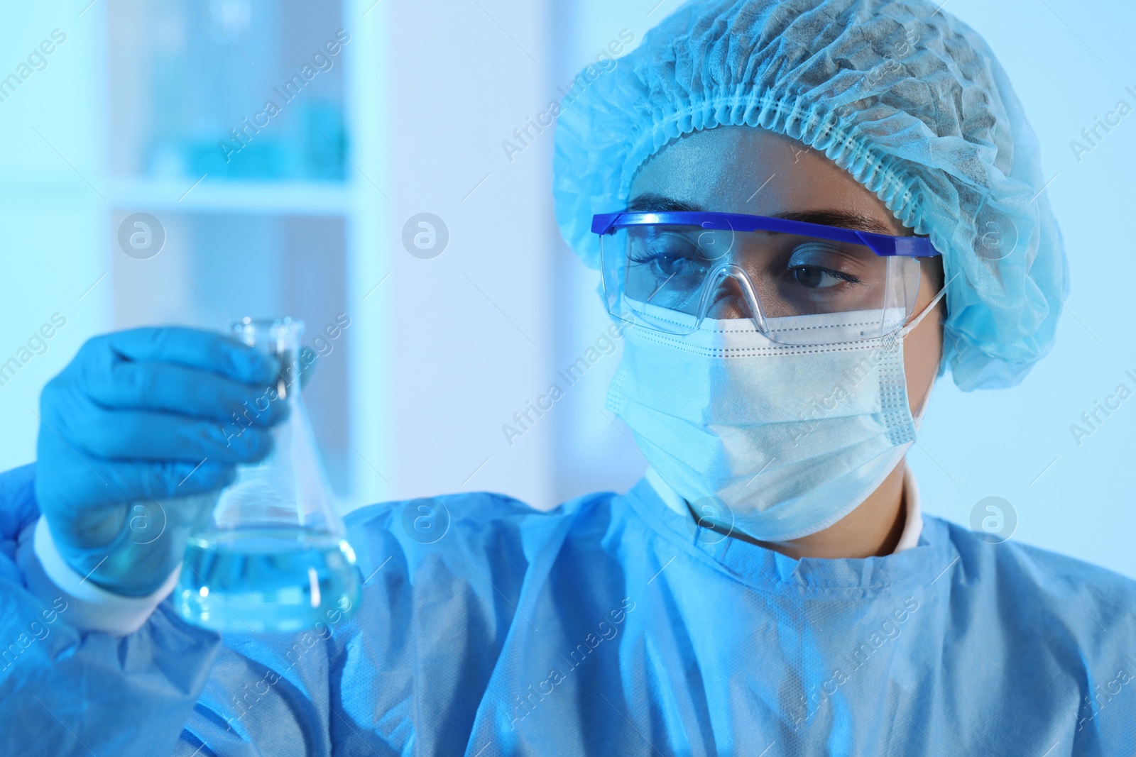 Photo of Scientist working with sample in laboratory. Medical research