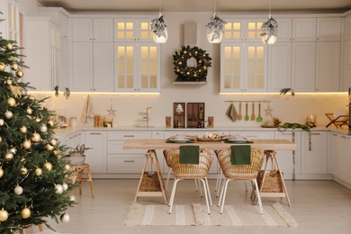 Spacious kitchen decorated for Christmas. Interior design