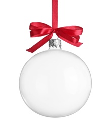 Photo of Transparent glass Christmas ball with red ribbon and bow isolated on white