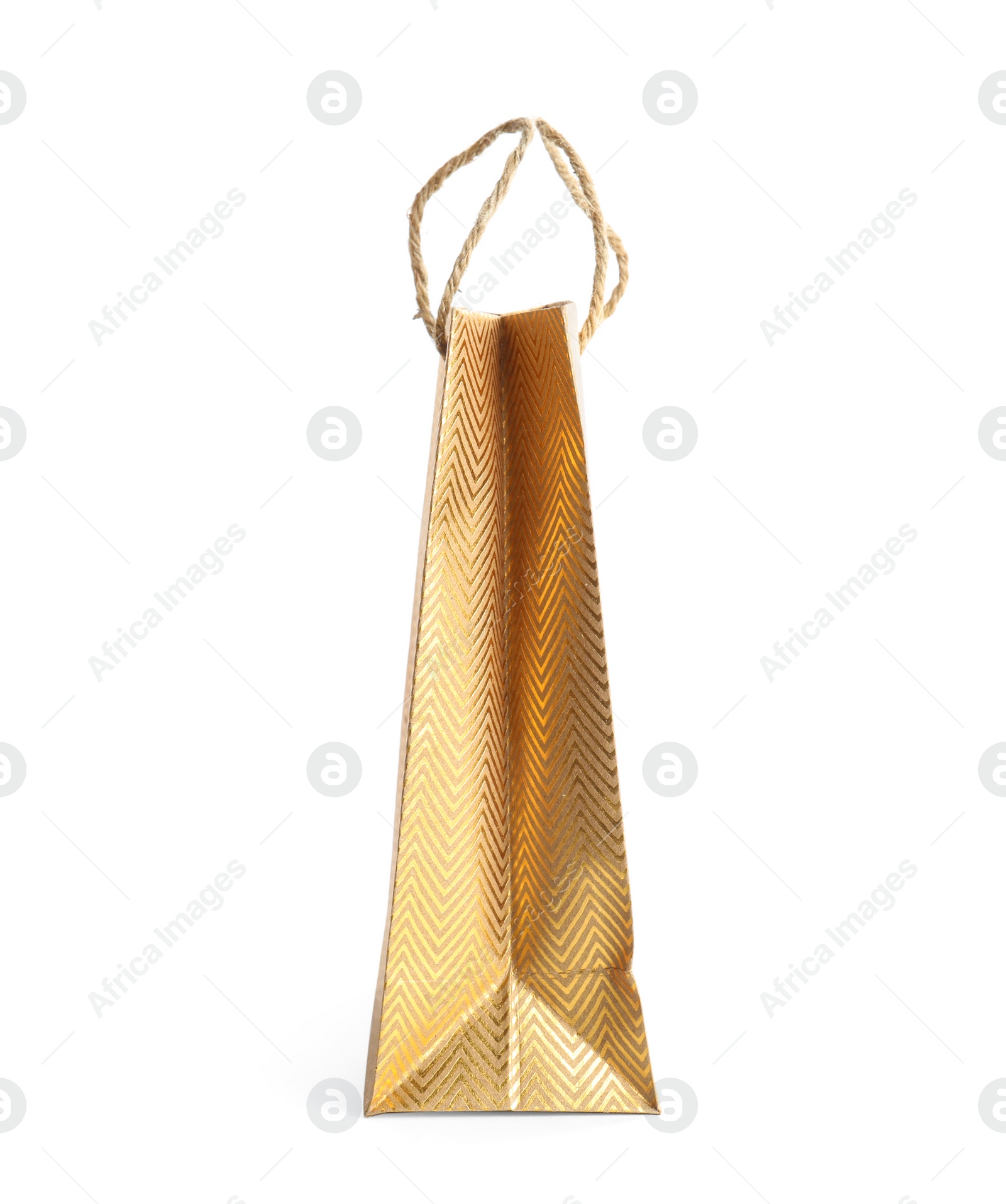 Photo of Golden paper shopping bag isolated on white