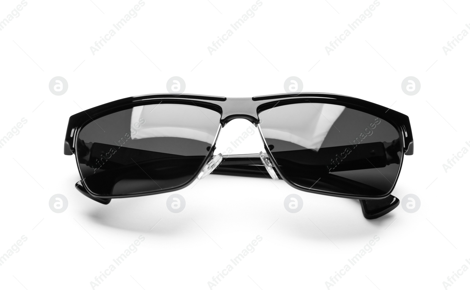 Photo of Stylish sunglasses on white background. Fashionable accessory