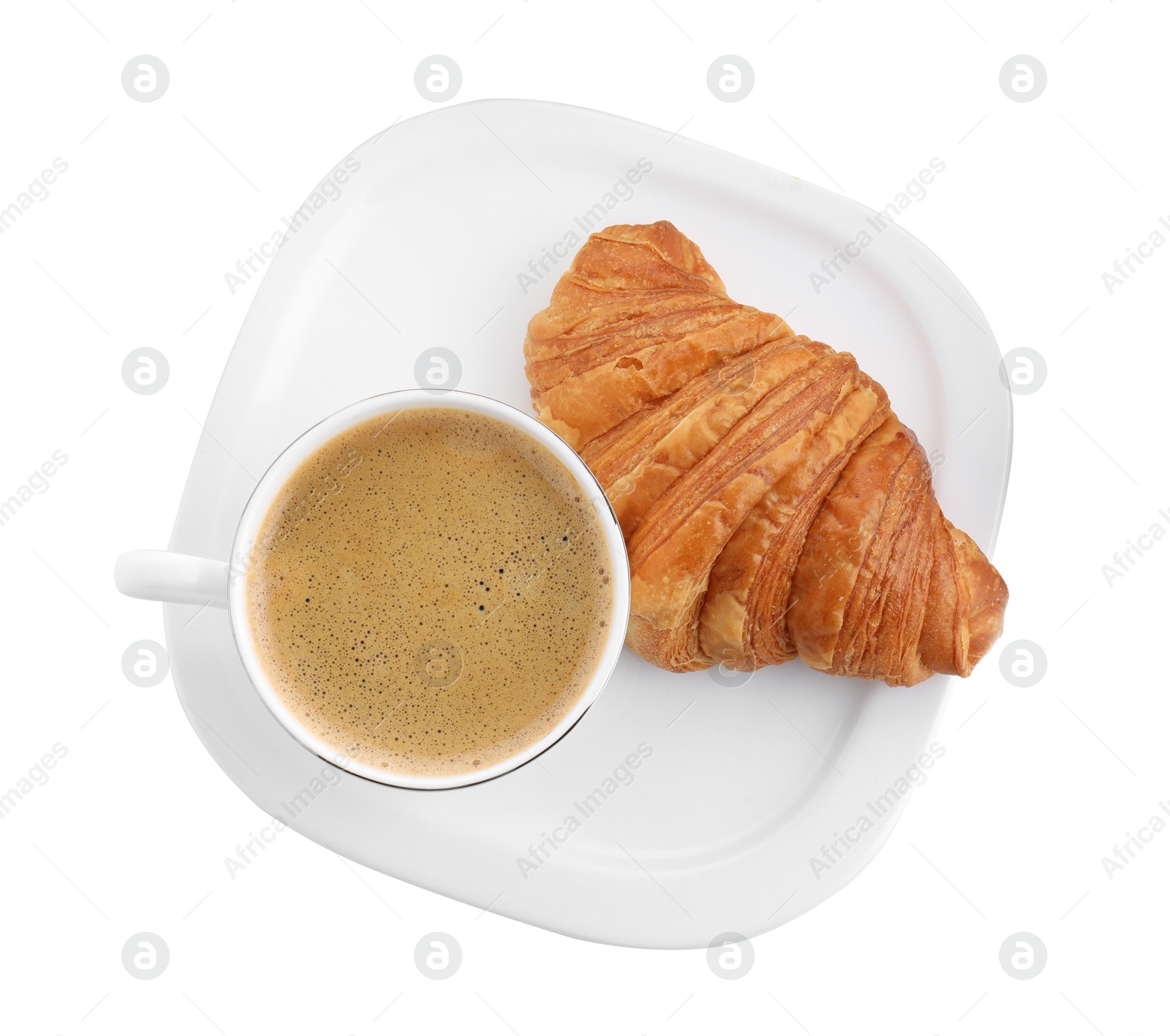 Photo of Fresh croissant and coffee isolated on white, top view. Tasty breakfast