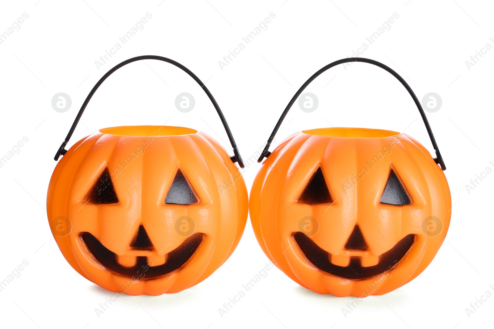 Photo of Halloween trick or treat buckets isolated on white