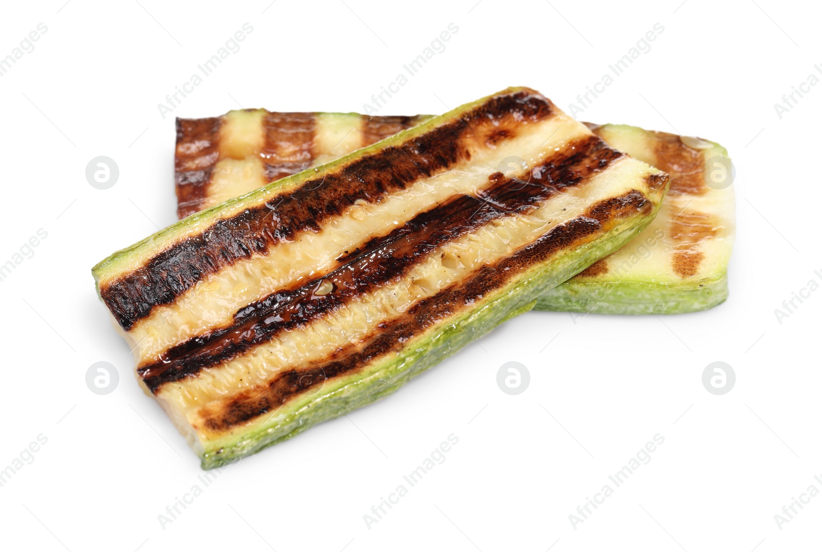 Photo of Slices of delicious grilled zucchini isolated on white