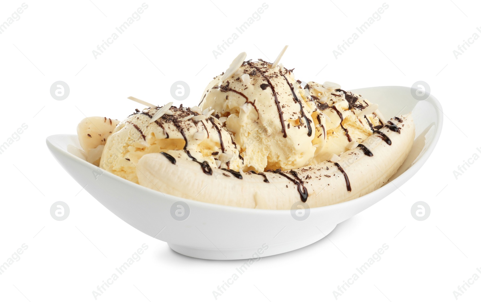 Photo of Delicious banana split ice cream with toppings isolated on white