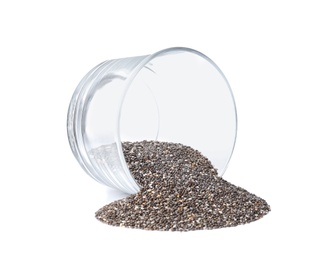 Photo of Chia seeds scattered from glass bowl isolated on white