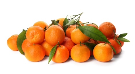 Photo of Fresh ripe tangerines  with green leaves on white background