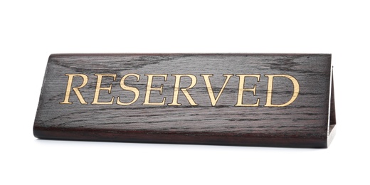 Elegant wooden sign RESERVED on white background. Table setting element