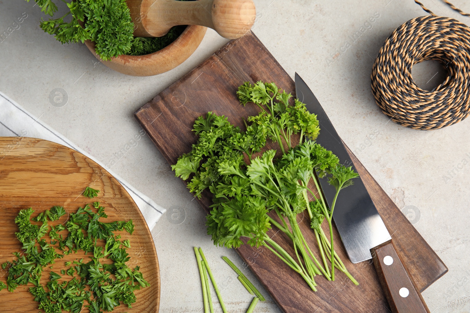 Photo of Flat lay composition with fresh green parsley on grey background