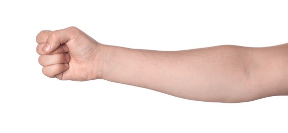 Playing rock, paper and scissors. Man making rock on white background, closeup