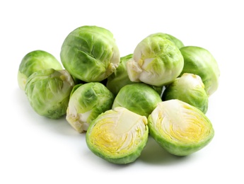 Photo of Pile of fresh Brussels sprouts on white background