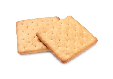 Photo of Two crispy crackers isolated on white. Delicious snack