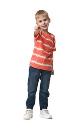 Happy little boy dancing on white background