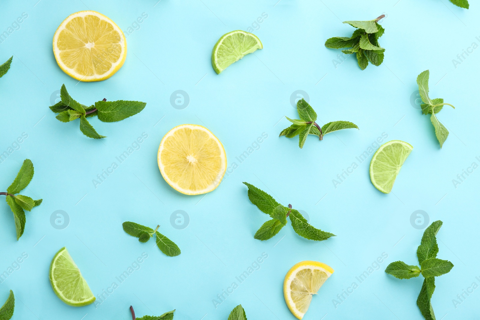 Photo of Flat lay composition with fresh mint leaves and citrus fruit on color background