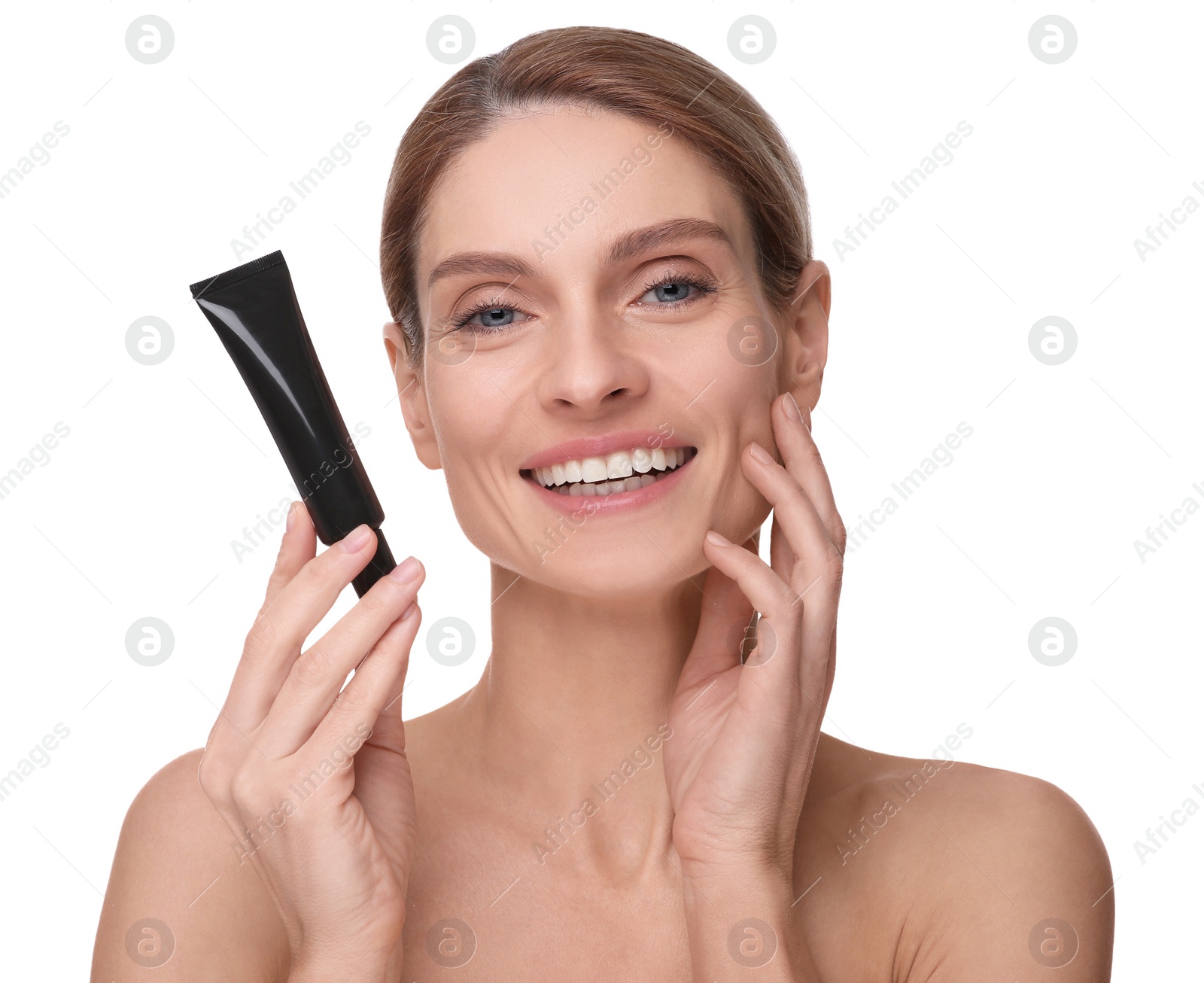 Photo of Woman holding tube with foundation on white background