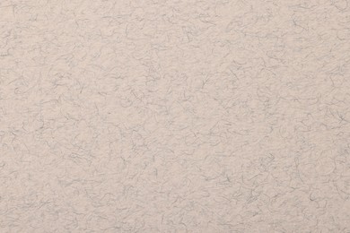 Photo of Texture of beige paper sheet as background, top view