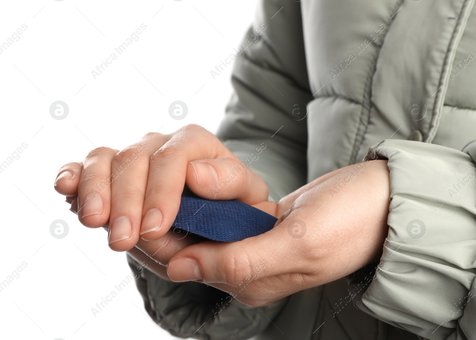 Photo of Woman holding hand warmer on white background, closeup