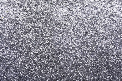 Beautiful shiny grey glitter as background, closeup